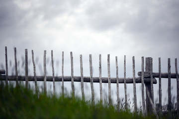 Wooden fence in field in Newfoundland