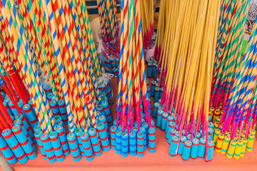 Colorful local mini Thai rocket for sale at the rocket festival in Thailand.