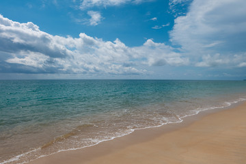 Sea beach shore with blue sky summer background.