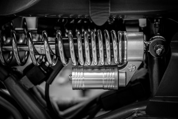 Obraz na płótnie Canvas Black and white image of vintage motorbike closeup
