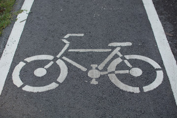 Obraz premium sign of cycling on the road