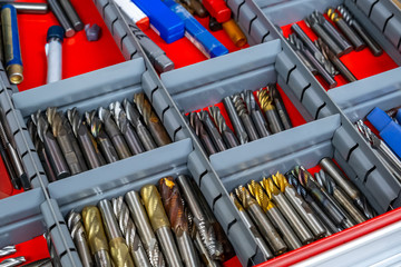 Fototapeta premium New end mills in a machine shop tool box