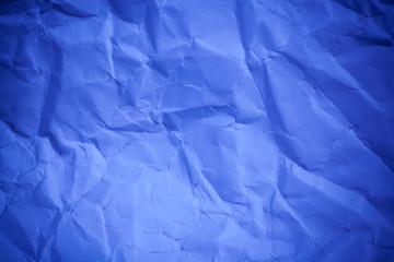 Blue crumpled paper texture background.