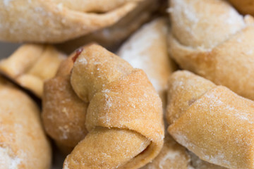 Fototapeta na wymiar shortcrust pastry roll crosiisants with marmalade