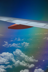 Fototapeta premium Vue d'avion ciel bleu arc-en-ciel coloré joyeux