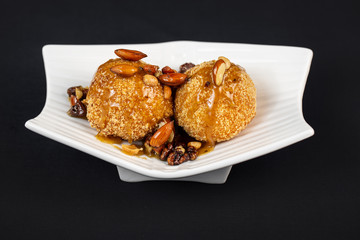 Dessert from ice cream with nuts