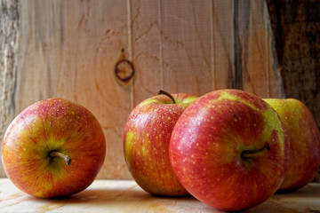Apples on wooden background