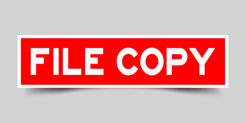 Square red sticker label in word file copy on gray background