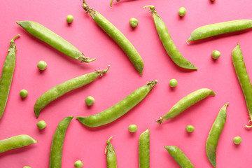 Tasty fresh peas on color background
