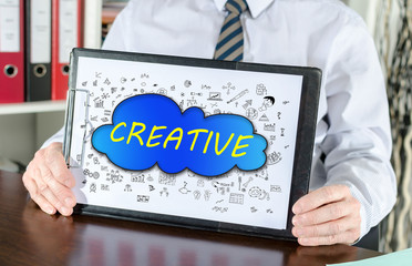 Creativity concept on a clipboard