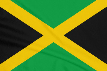Flag of Jamaica on textured fabric. Patriotic symbol