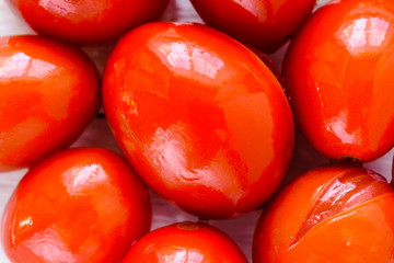 Red tomatoes close-up, pickled vegetables