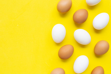 Eggs on yellow background.