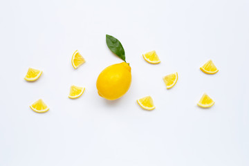 Fresh lemon with slices on white