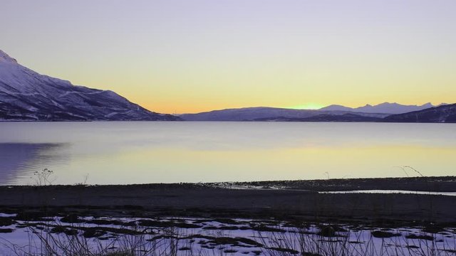 Panorama over north norwegian fjord and mountains, amazing colorful sunset