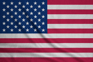 Fototapeta premium Flag of USA on textured fabric. Patriotic symbol