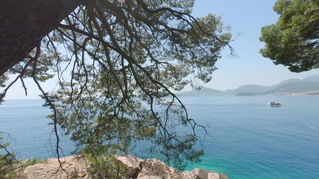 View in the Adriatic sea from Milocer Park. Coast Budva Riviera.