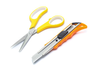yellow scissors and cutter isolated on White Background