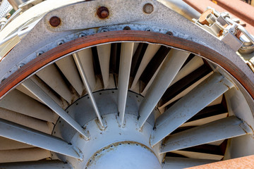 A rusty old airplane jet engine