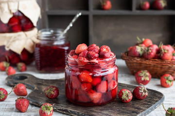 Strawberry jam in a glass jar