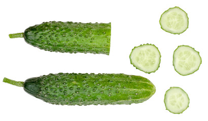 Slices of cucumber isolated on white background, top view