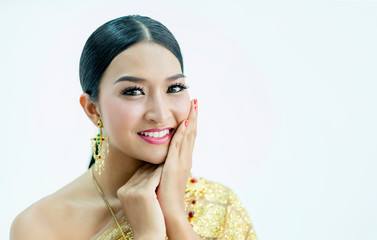 Beautiful Thai girl in traditional costume identity culture of thailand and has a beautiful smile...