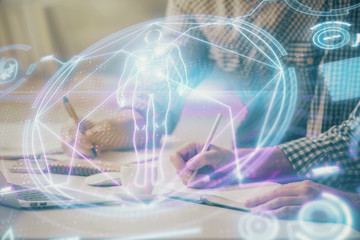 Science hologram with man working on computer on background. Concept of study. Double exposure.