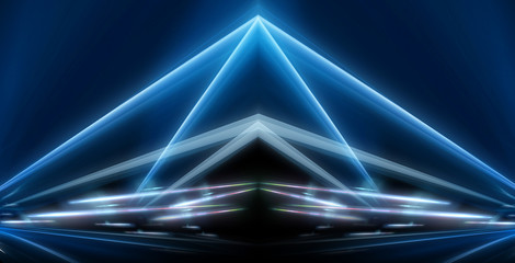 Fototapeta premium Abstract light tunnel. Night view, city lights, neon. Abstract lines and rays of neon light. Movement speed, reflection. Night scene with neon spotlights, glare. Dark abstract background with neon.