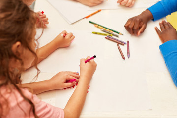 Obraz na płótnie Canvas Children draw creative fantasy pictures