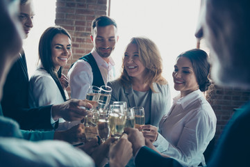Close up photo of big company of people having rest drinking champagne glad to have christmas...