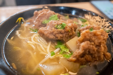 Taiwanese food of soup noodles with pork ribs cakes