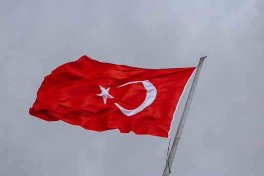 Turkey flag waving on the wind in the evening