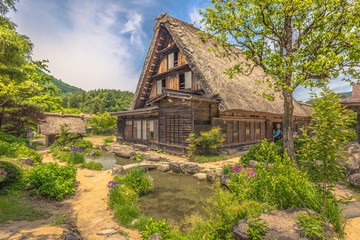 Fototapeta na wymiar Shirakawa-go - May 27, 2019: The traditional buildings of the village of Shirakawa-go, Japan
