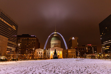 St Louis, Missouri \ USA - January 15 2019: Night winter view of an old courthouse with Gateway Arch behind