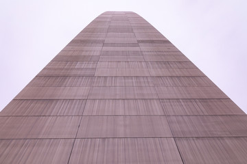 Up close view at St Louis Gateway arch. A side of the Arch creates a path into the sky