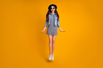 Full length body size view photo attractive cute charming people millennial free time summer travel specs satisfied striped jeans denim outfit fashionable scream laughter isolated yellow background