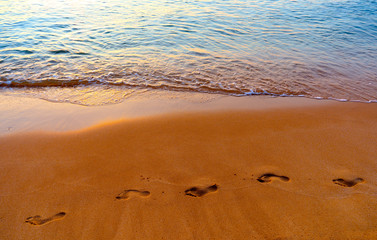 footprints on the beach