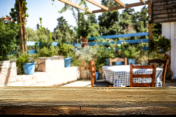 Desk of free space for your decoration and summer garden background 