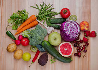 Different vegetables and fruits on the wooden table