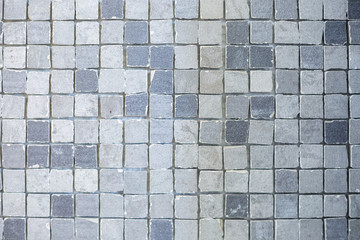 texture of small ceramic tiles in a chaotic manner background for elite interior of bathroom, wc, lavatory and restroom