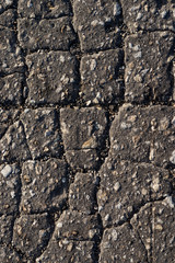 Macro texture of old cracked asphalt
