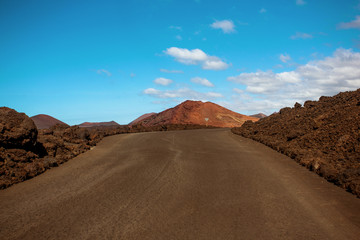 Naklejka premium Big empty road in a mountains