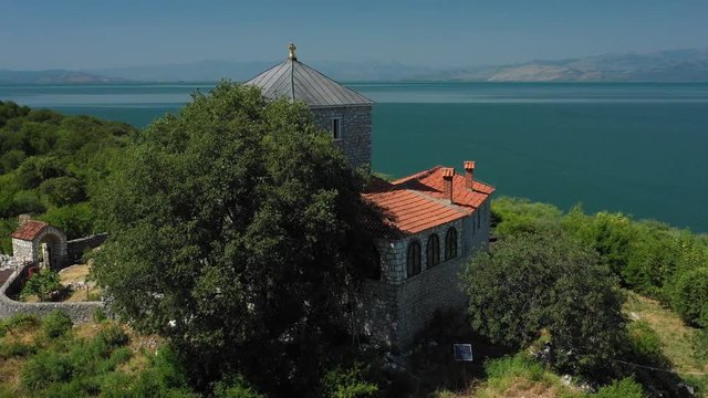 Very beautiful views of Lake Skadar in Montenegro taken from drone. Moračnik Monastery  is a Serbian Orthodox monastery on Moračnik island on Skadar Lake in modern-day Montenegro. It is positioned acr