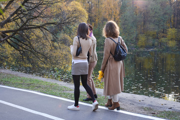 Fototapeta premium Autumn. Walk the youth in the autumn park.