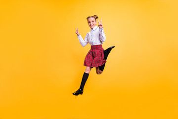 Fototapeta na wymiar Full length body size view of her she nice attractive lovely cheerful cheery positive pre-teen girl having fun free time showing double v-sign enjoy isolated over bright vivid shine yellow background