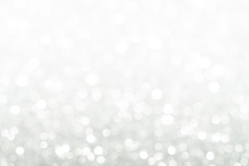 Fototapeta na wymiar Silver sparkle glitter abstract bokeh background Christmas 