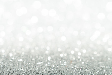 Silver sparkle glitter abstract bokeh background Christmas	