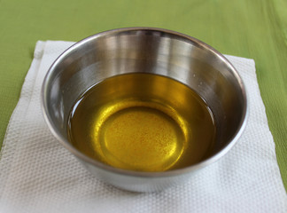 Desi ghee in a steel katori