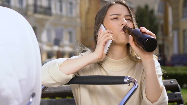 Teen Mother With Baby Stroller Talking Phone, Drinking Beer, Unwanted Pregnancy