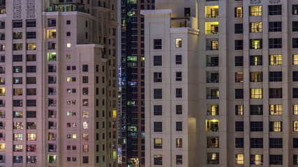 Fototapeta na wymiar JBR at night timelapse with residential skyscrapers in Dubai, United Arab Emirates